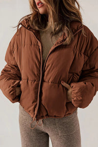 Wärmende Damen-Winterjacke mit Kapuze