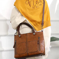 Elegante Damen Handtasche mit Trageketten